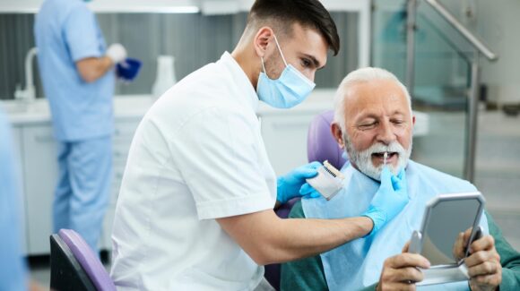 The Pros and Cons of Dental Implants Versus Dentures for Seniors