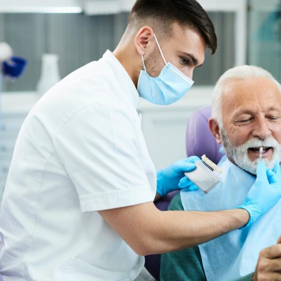 The Pros and Cons of Dental Implants Versus Dentures for Seniors