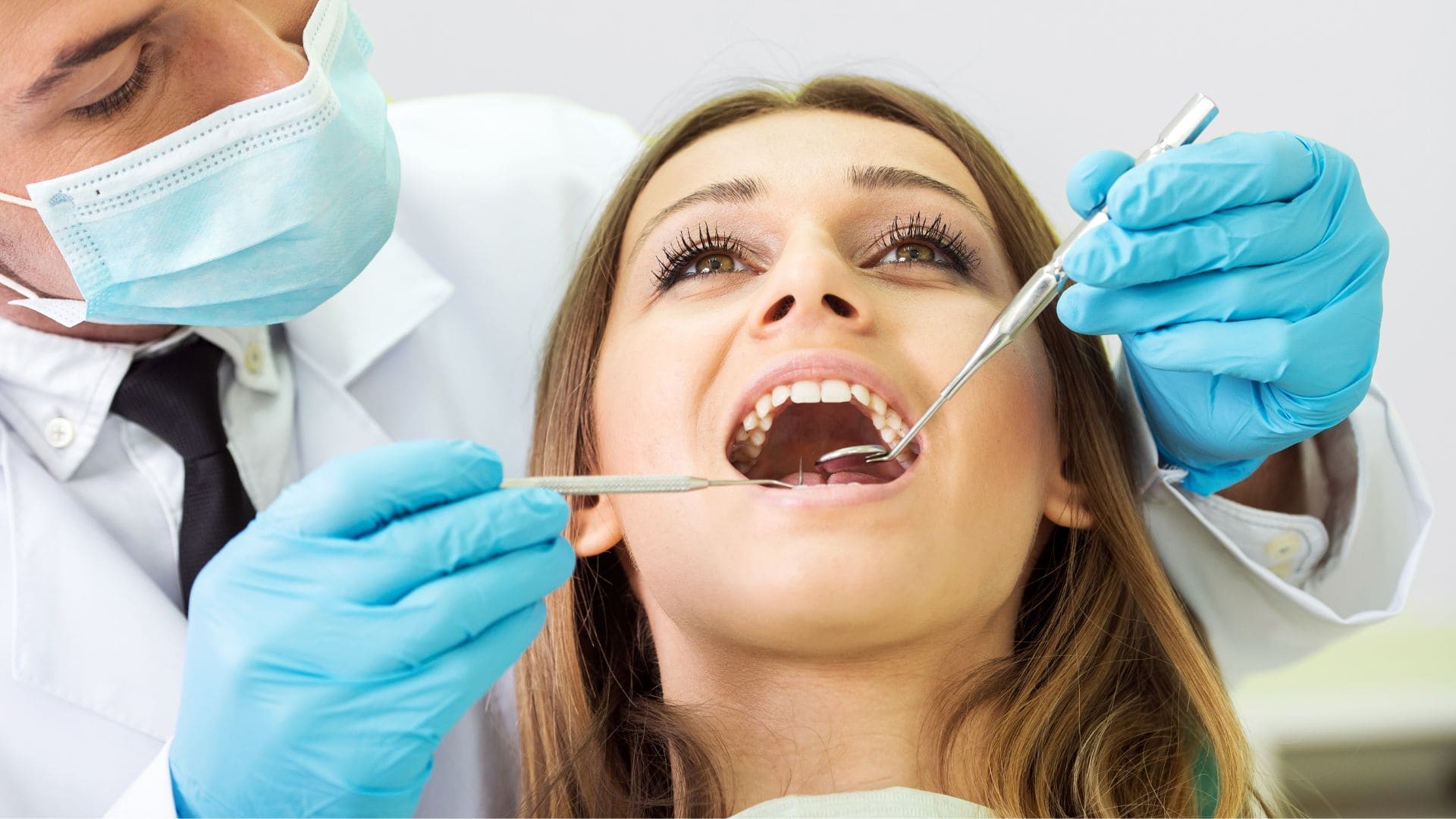 Woman getting her teeth checked - bruxism - Midland Bay Dental.